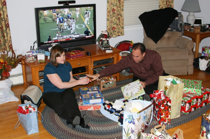 Opening presents on Christmas Eve